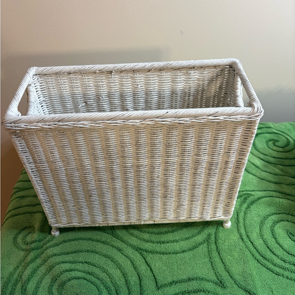 Vintage white wicker magazine box, some paint chipping on bottom. Very sturdy